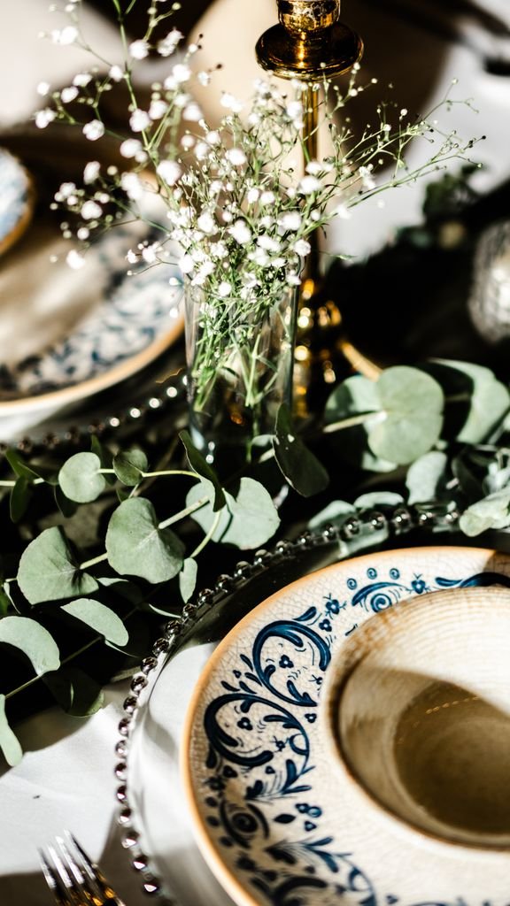 Chic and elegant table setting featuring floral arrangement, ideal for weddings and special events.