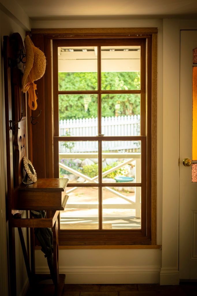 Vintage mudroom with a warm, sunny view through a window in Tamborine Mountain, Queensland, Australia.